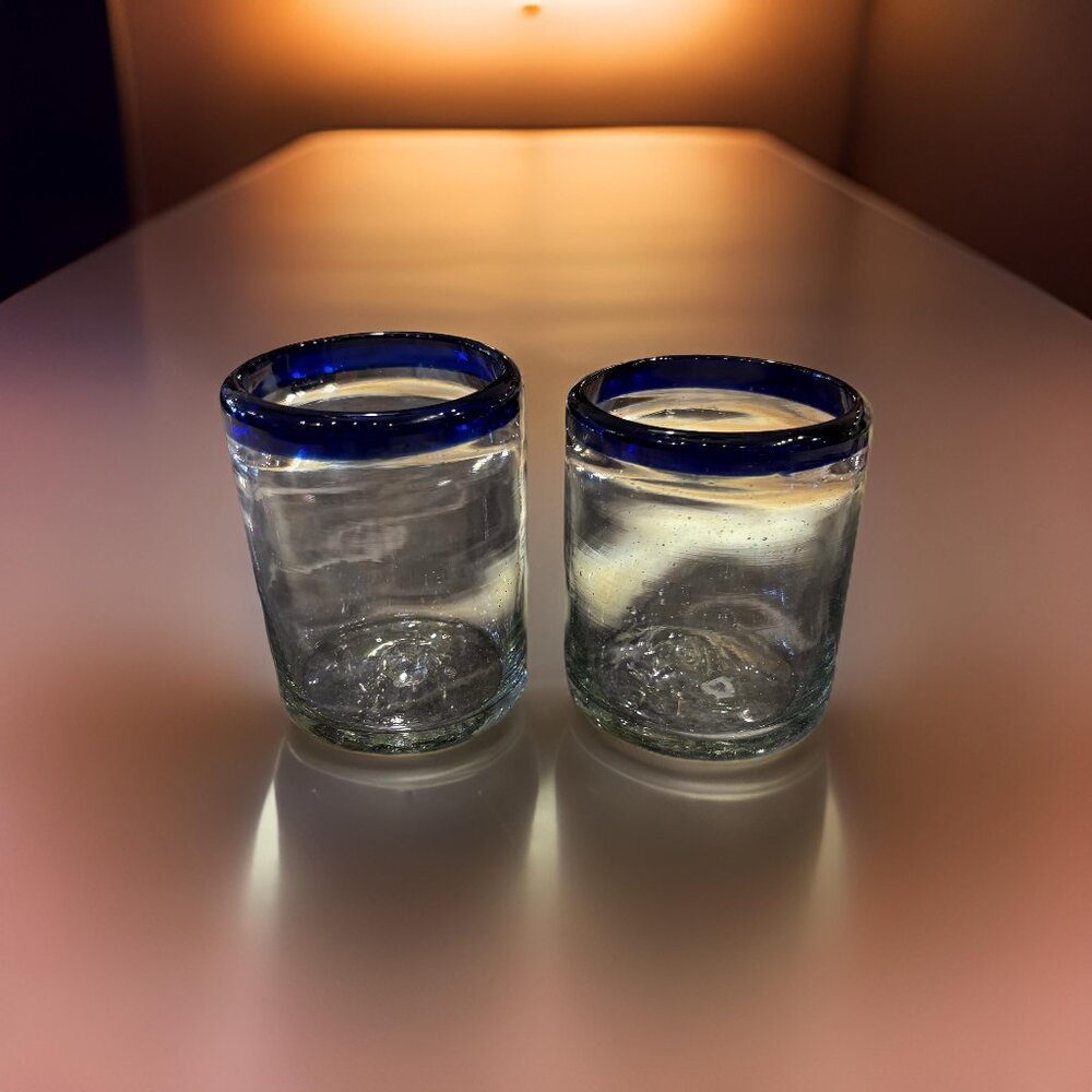 Elegant Glass Tumblers with Blue Rim